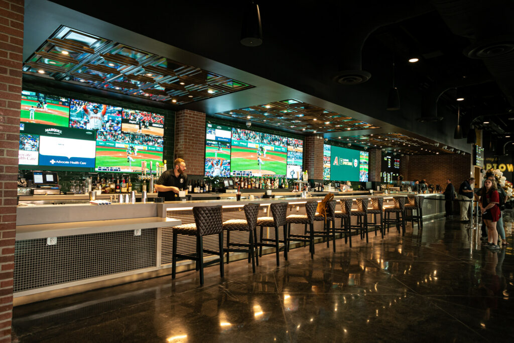 Video screens behind the bar at the sportsbook inside Chase Field, home of the Arizona Diamondbacks.