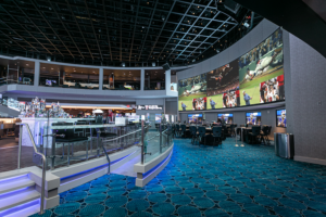 The Ocean Resort sportsbook in Atlantic City with multiple screens and a massive wraparound video wall.