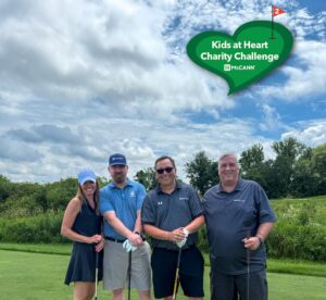 A team at the McCann annual Kids at Heart charity golf tournament.