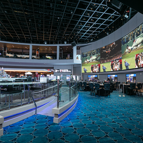 The Ocean Resort sportsbook in Atlantic City with multiple screens and a massive wraparound video wall.